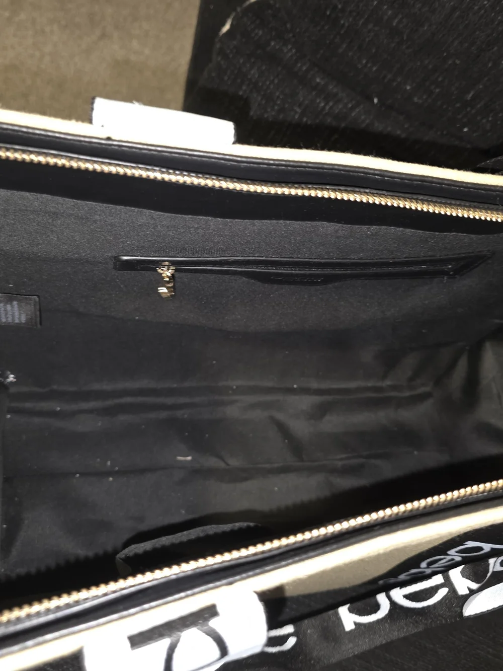 bebe Tan Canvas Duffel with Black Branded Straps